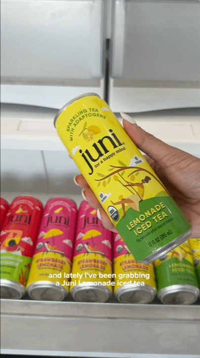 A hand presenting a Juni drink in a creator-shot example from Zagged’s UGC portfolio
